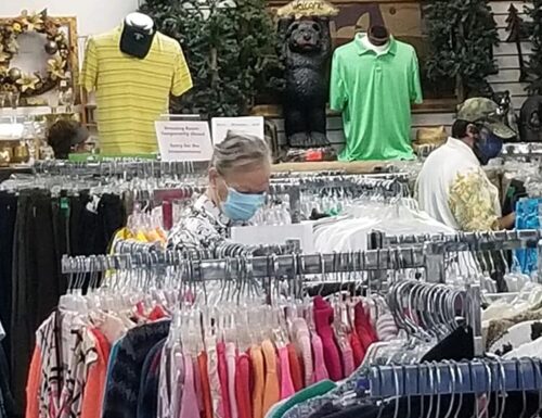 shoppers_in_thrift_store Shoppers in the South Coast Hospice Thrift Store.